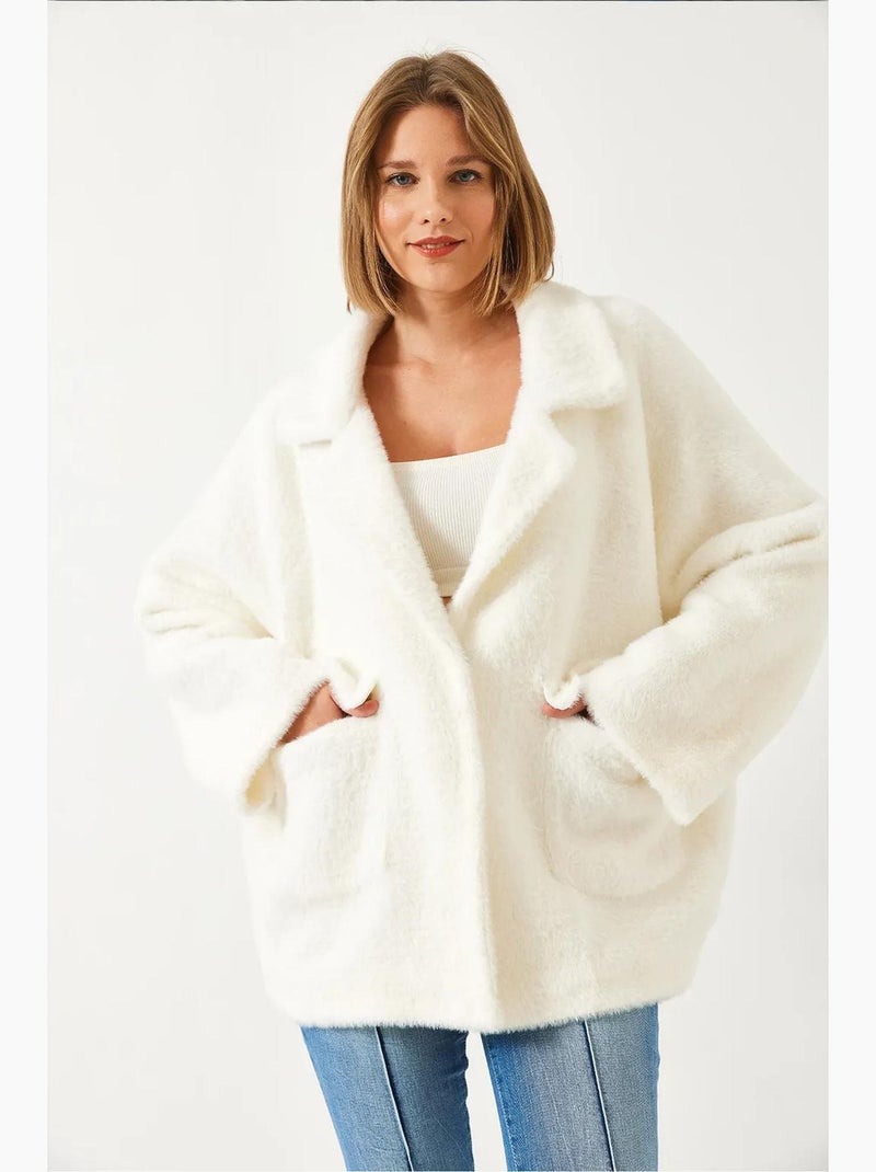 Cappotto oversize in pelliccia sintetica lucci Avorio - Kiabi