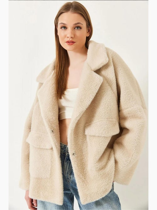 Cappotto oversize in pelliccia sintetica lucci - Kiabi Cappotto oversize in pelliccia sintetica lucci - Kiabi