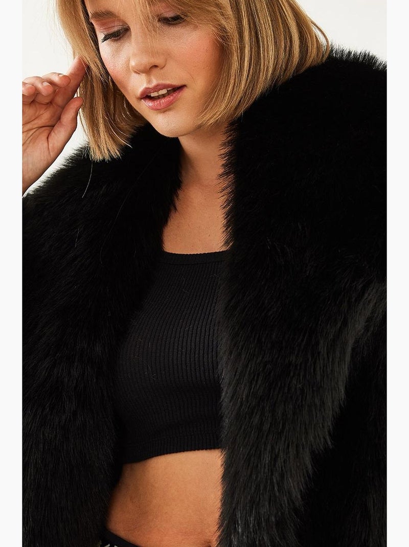 Cappotto oversize in pelliccia sintetica lucci Nero - Kiabi