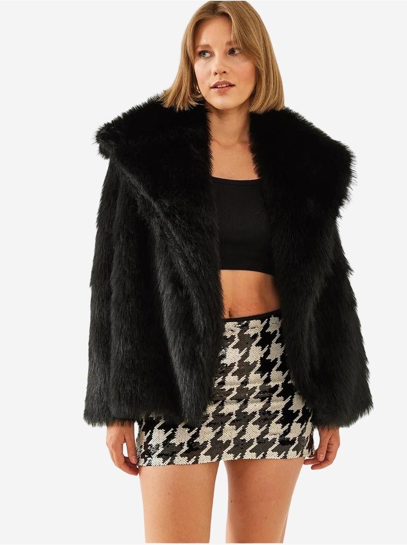 Cappotto oversize in pelliccia sintetica lucci Nero - Kiabi