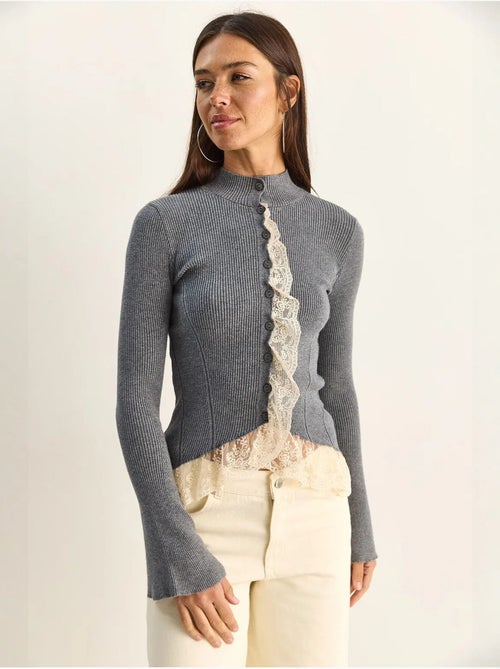 Cardigan a coste con mezzo collo alto lucci - Kiabi Cardigan a coste con mezzo collo alto lucci - Kiabi