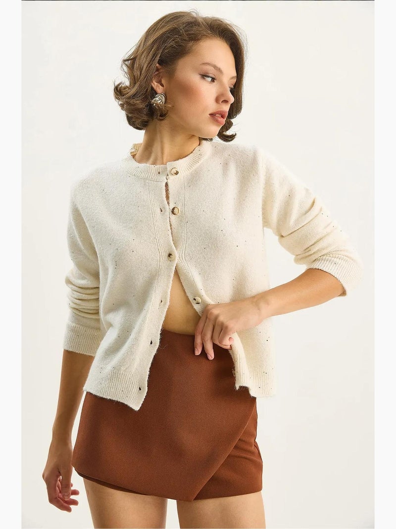 Cardigan a coste testurizzato con dettaglio di paillettes lucci Crema - Kiabi