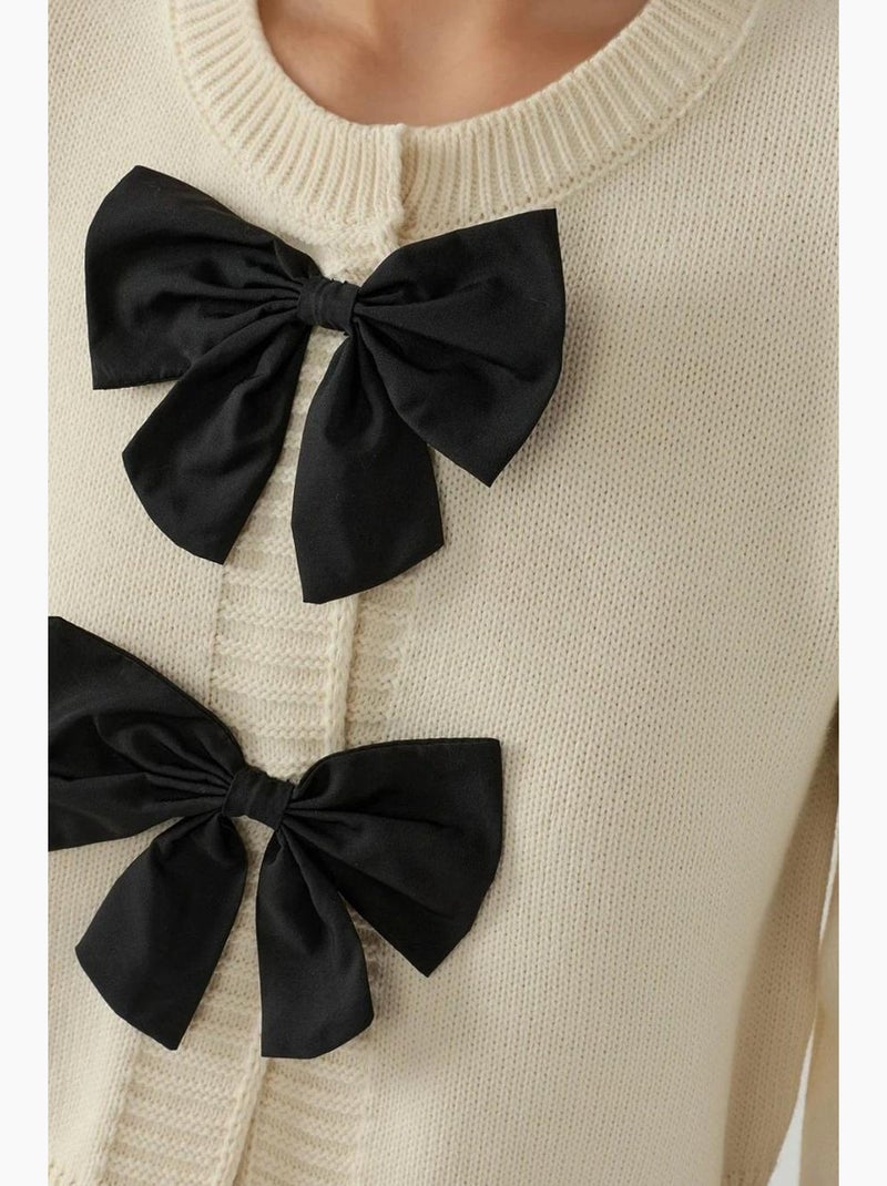 Cardigan a maglia spessa con girocollo e dettaglio fiocco hiccup Avorio - Kiabi