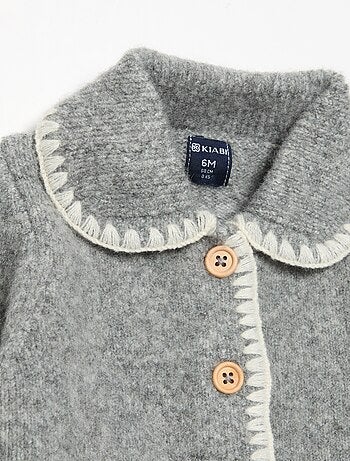 Cardigan con bordi fantasia a contrasto