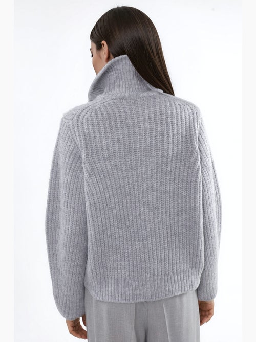 Cardigan con zip a collo alto in maglia spessa testurizzata hiccup - Kiabi Cardigan con zip a collo alto in maglia spessa testurizzata hiccup - Kiabi
