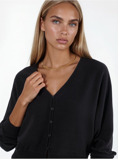 Cardigan corto a coste con scollo a v busem - Kiabi Cardigan corto a coste con scollo a v busem - Kiabi