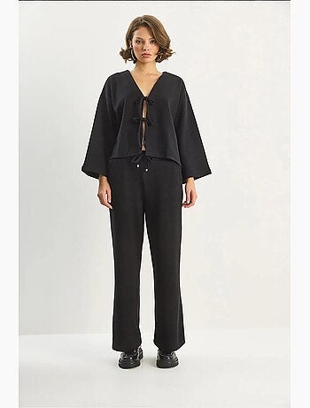 Cardigan in maglia con scollo a v e set di pantaloni a gamba ampia lucci