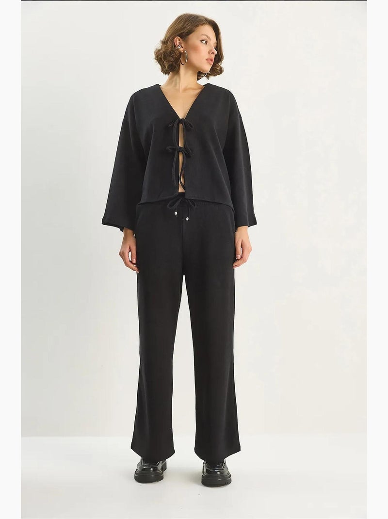 Cardigan in maglia con scollo a v e set di pantaloni a gamba ampia lucci Nero - Kiabi