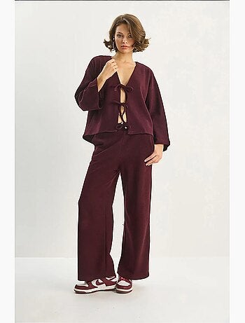 Cardigan in maglia con scollo a v e set di pantaloni a gamba ampia lucci