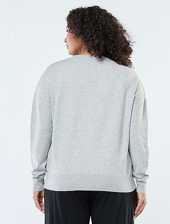Cardigan in maglia fine con apertura abbottonata