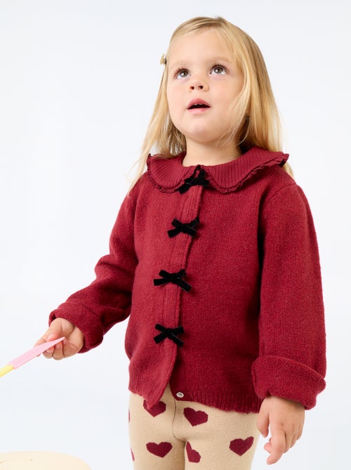 Cardigan in maglia fine con fiocchi fantasia - Kiabi Cardigan in maglia fine con fiocchi fantasia - Kiabi