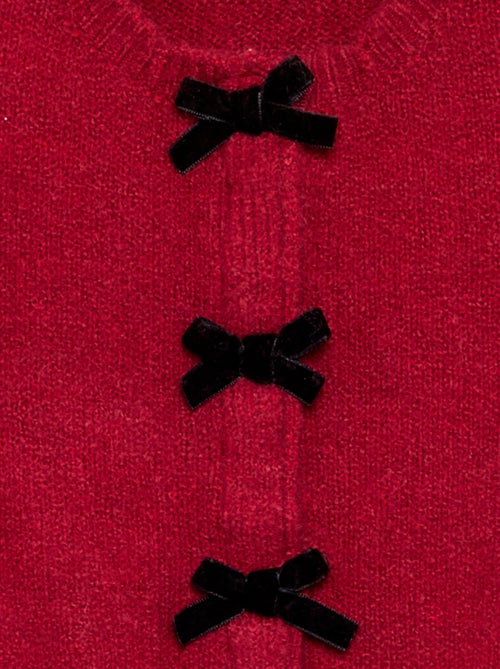 Cardigan in maglia fine con fiocchi fantasia - Kiabi Cardigan in maglia fine con fiocchi fantasia - Kiabi