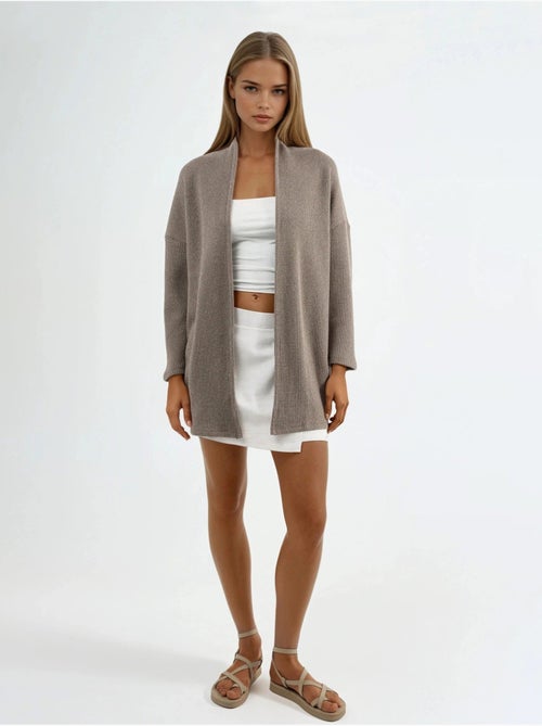 Cardigan lungo a coste in maglia con colletto aperto busem - Kiabi Cardigan lungo a coste in maglia con colletto aperto busem - Kiabi