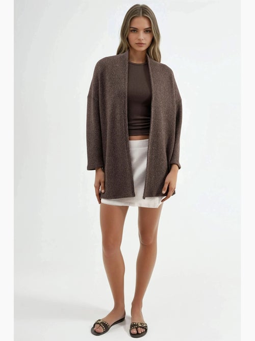 Cardigan lungo a coste in maglia con colletto aperto busem - Kiabi Cardigan lungo a coste in maglia con colletto aperto busem - Kiabi