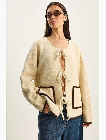 Cardigan oversize in maglia con chiusura a laccetto lucci