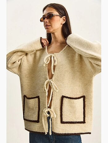 Cardigan oversize in maglia con chiusura a laccetto lucci