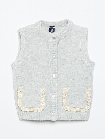 Cardigan senza maniche con tasche ricamate
