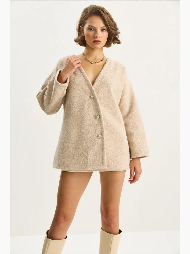 Cardigan testurizzato con scollo a v e bottoni lucci Avorio - Kiabi