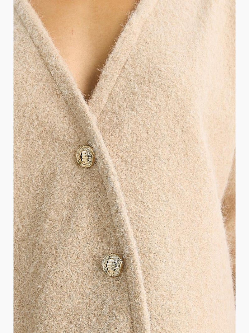Cardigan testurizzato con scollo a v e bottoni lucci Avorio - Kiabi