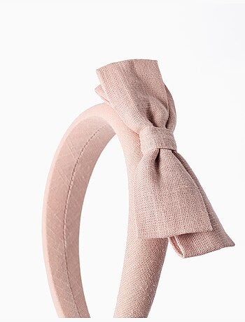 Cerchietto imbottito con fiocco sulla sommità