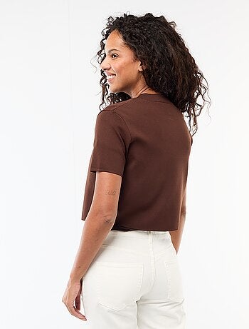 Chiusura con gioiello dorato al collo