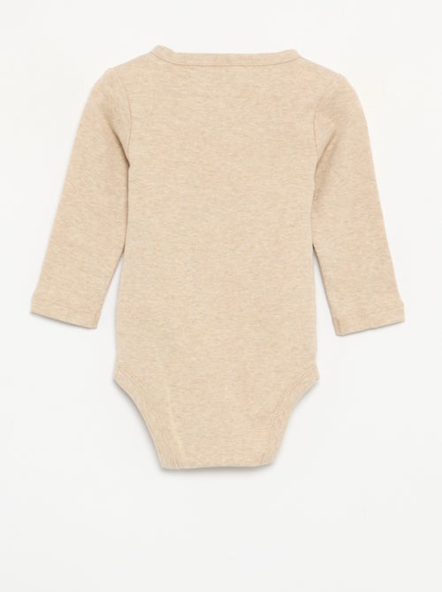 Completo 2 pezzi - Body a maniche lunghe + leggings - Kiabi Completo 2 pezzi - Body a maniche lunghe + leggings - Kiabi