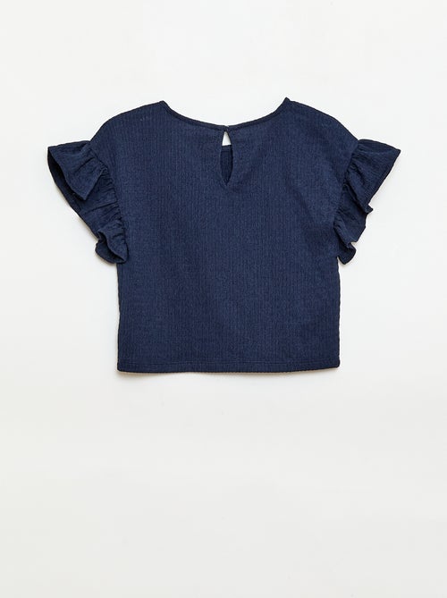 Completo a righe t-shirt + pantaloni - 2 pezzi - Kiabi Completo a righe t-shirt + pantaloni - 2 pezzi - Kiabi