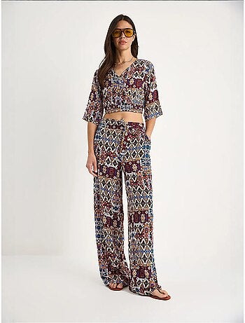Completo blusa e pantaloni a fantasia lucci