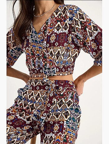 Completo blusa e pantaloni a fantasia lucci