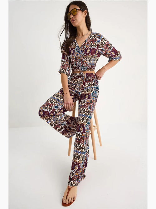 Completo blusa e pantaloni a fantasia lucci - Kiabi Completo blusa e pantaloni a fantasia lucci - Kiabi