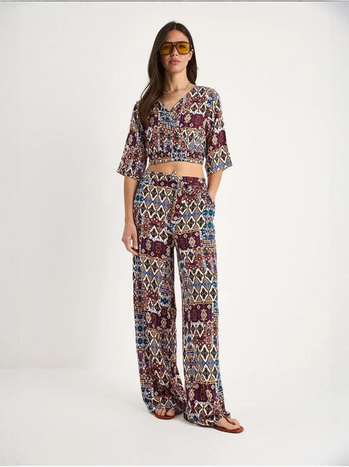 Completo blusa e pantaloni a fantasia lucci - Kiabi Completo blusa e pantaloni a fantasia lucci - Kiabi