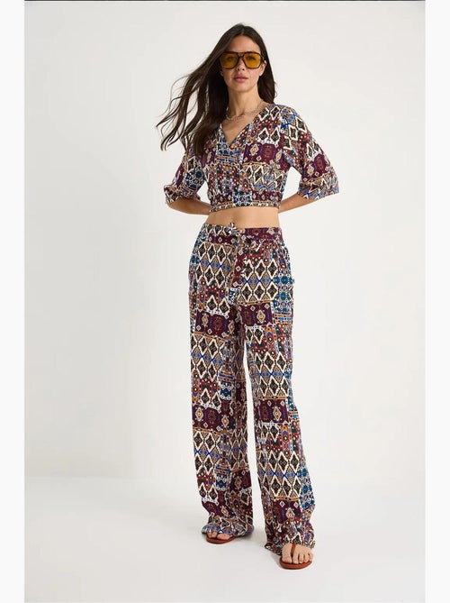 Completo blusa e pantaloni a fantasia lucci - Kiabi Completo blusa e pantaloni a fantasia lucci - Kiabi