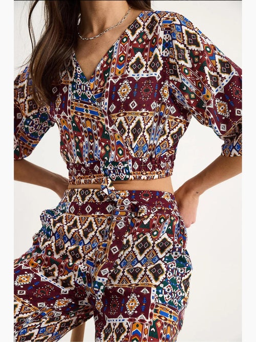 Completo blusa e pantaloni a fantasia lucci - Kiabi Completo blusa e pantaloni a fantasia lucci - Kiabi