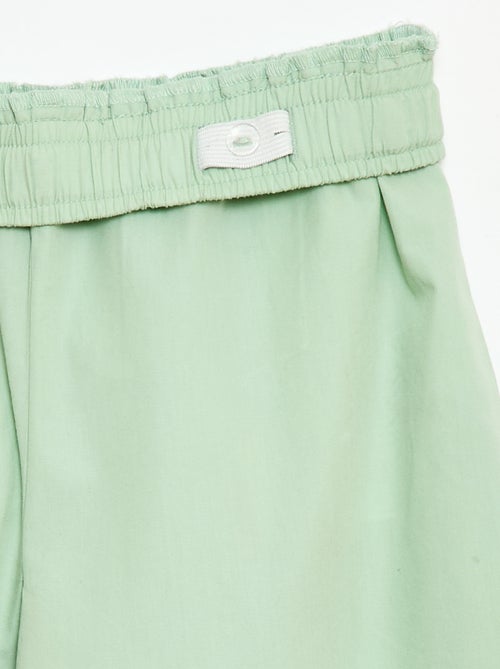 Completo blusa senza maniche + pantaloni - 2 pezzi - Kiabi Completo blusa senza maniche + pantaloni - 2 pezzi - Kiabi