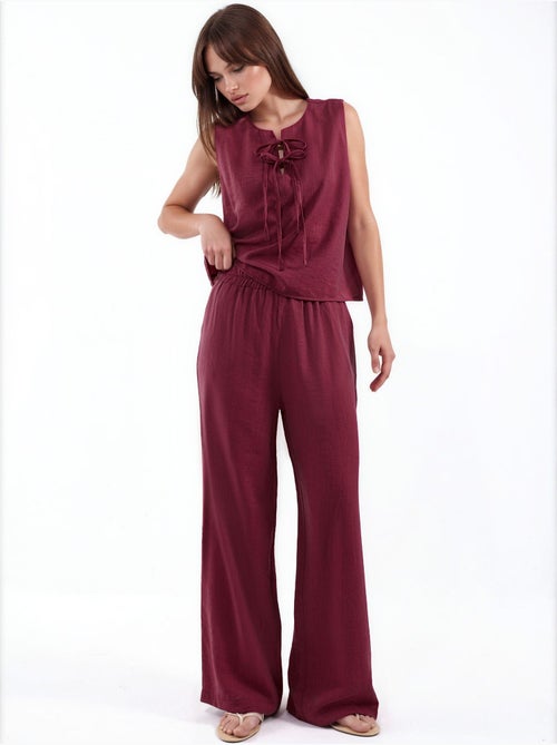 Completo con blusa senza maniche testurizzata e pantaloni a gamba ampia hiccup - Kiabi Completo con blusa senza maniche testurizzata e pantaloni a gamba ampia hiccup - Kiabi
