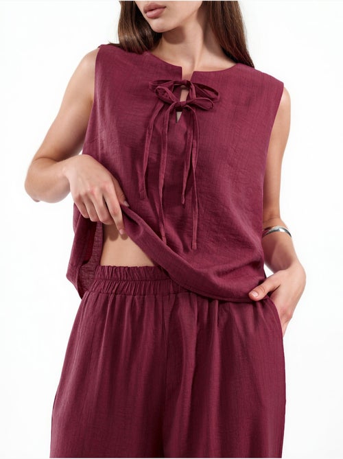 Completo con blusa senza maniche testurizzata e pantaloni a gamba ampia hiccup - Kiabi Completo con blusa senza maniche testurizzata e pantaloni a gamba ampia hiccup - Kiabi