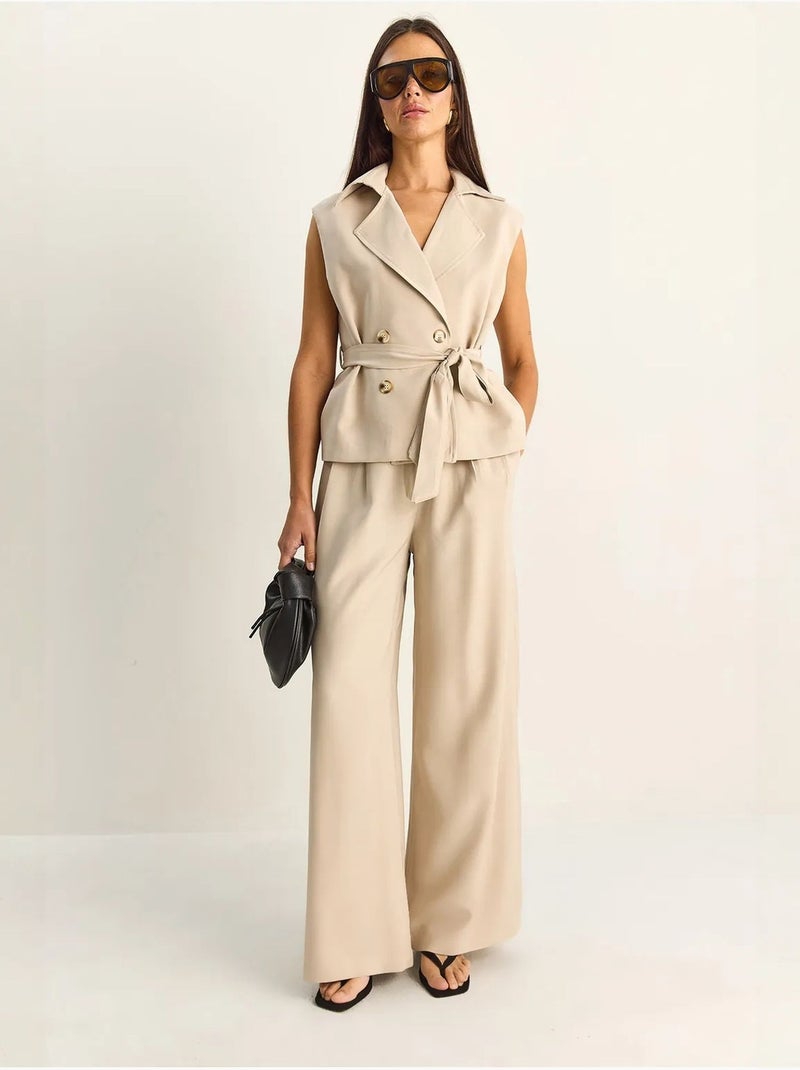 Completo coordinato a vita alta con gamba larga e collo a scialle lucci Beige argilla - Kiabi