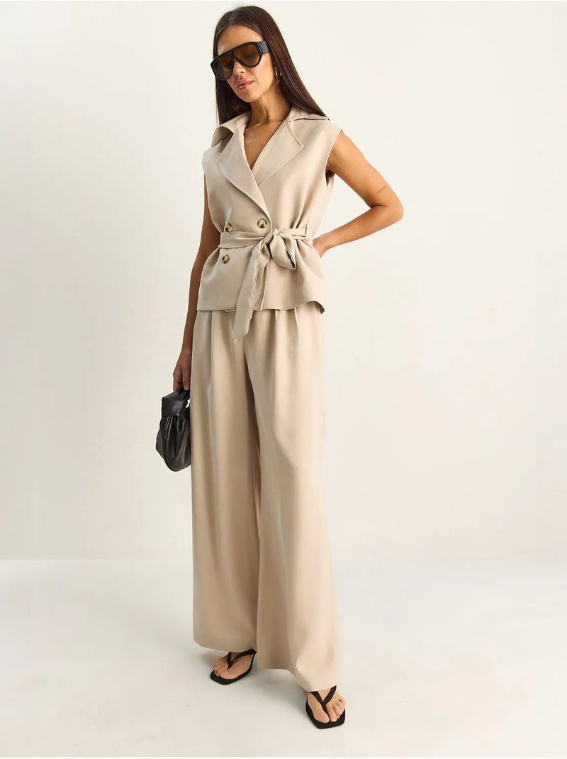 Completo coordinato a vita alta con gamba larga e collo a scialle lucci Beige argilla - Kiabi