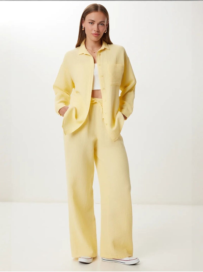 Completo coordinato due pezzi a vita alta con gamba ampia e collo a camicia istanbul Giallo limone - Kiabi