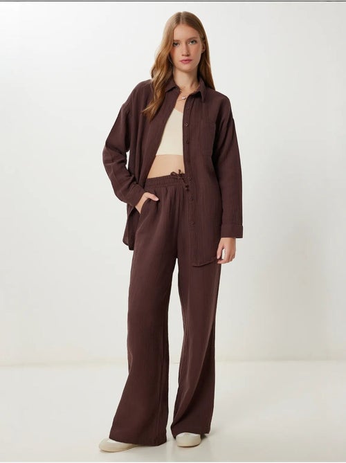 Completo coordinato due pezzi a vita alta con gamba ampia e collo a camicia istanbul - Kiabi