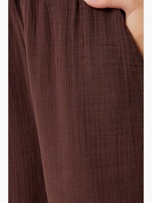 Completo coordinato due pezzi a vita alta con gamba ampia e collo a camicia istanbul - Kiabi