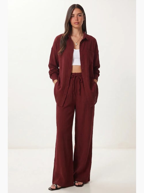 Completo coordinato due pezzi a vita alta con gamba ampia e collo a camicia istanbul - Kiabi