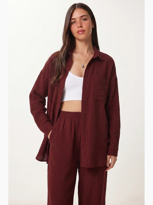 Completo coordinato due pezzi a vita alta con gamba ampia e collo a camicia istanbul - Kiabi