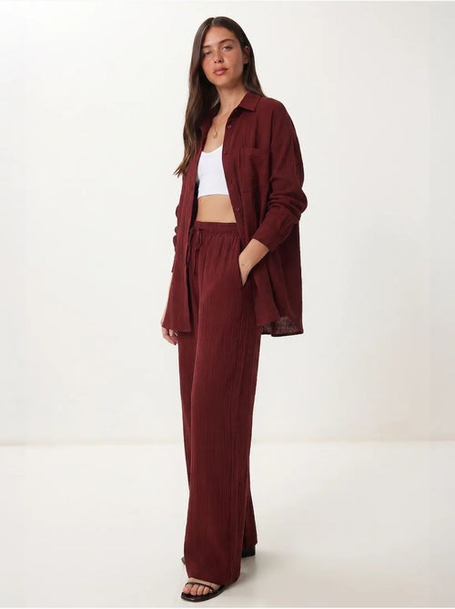 Completo coordinato due pezzi a vita alta con gamba ampia e collo a camicia istanbul - Kiabi