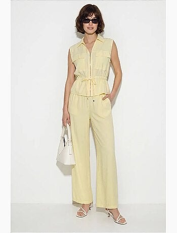 Completo coordinato elegante due pezzi con gilet e pantaloni larghi lucci