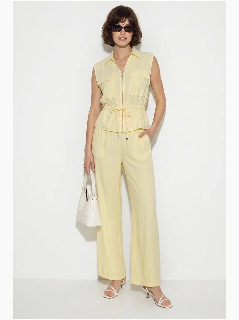 Completo coordinato elegante due pezzi con gilet e pantaloni larghi lucci Giallo limone - Kiabi