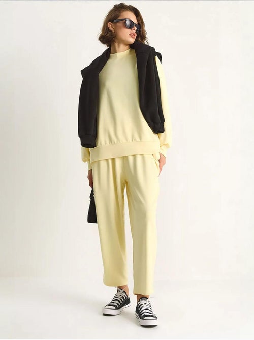 Completo coordinato in maglia due pezzi con maniche lunghe e girocollo lucci - Kiabi Completo coordinato in maglia due pezzi con maniche lunghe e girocollo lucci - Kiabi