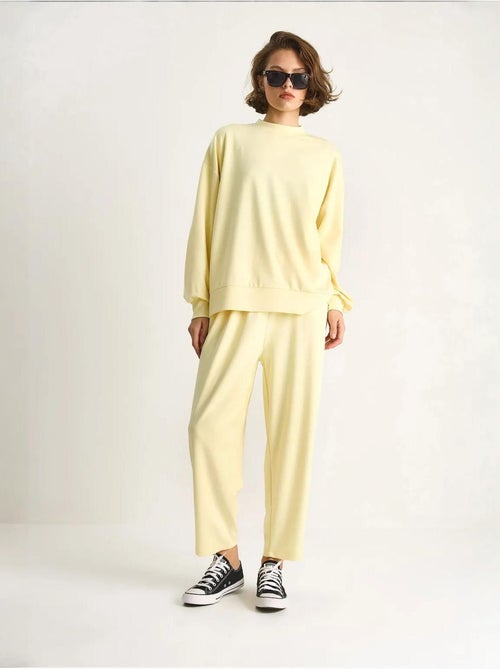 Completo coordinato in maglia due pezzi con maniche lunghe e girocollo lucci - Kiabi Completo coordinato in maglia due pezzi con maniche lunghe e girocollo lucci - Kiabi