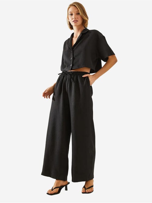 Completo due pezzi con colletto della giacca e pantaloni con bottoni e tasche lucci - Kiabi