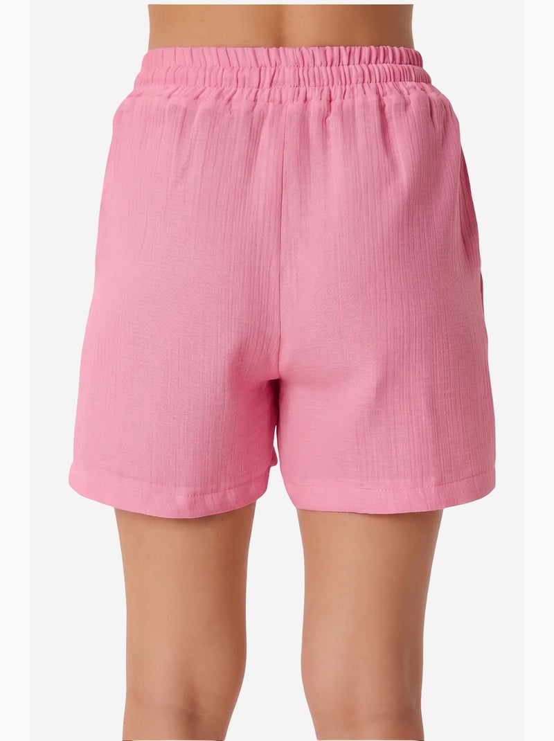Completo due pezzi in cotone con scollo a barca senza maniche e pantaloncini a gamba larga istanbul Rosa fluo/Solinotes - Kiabi
